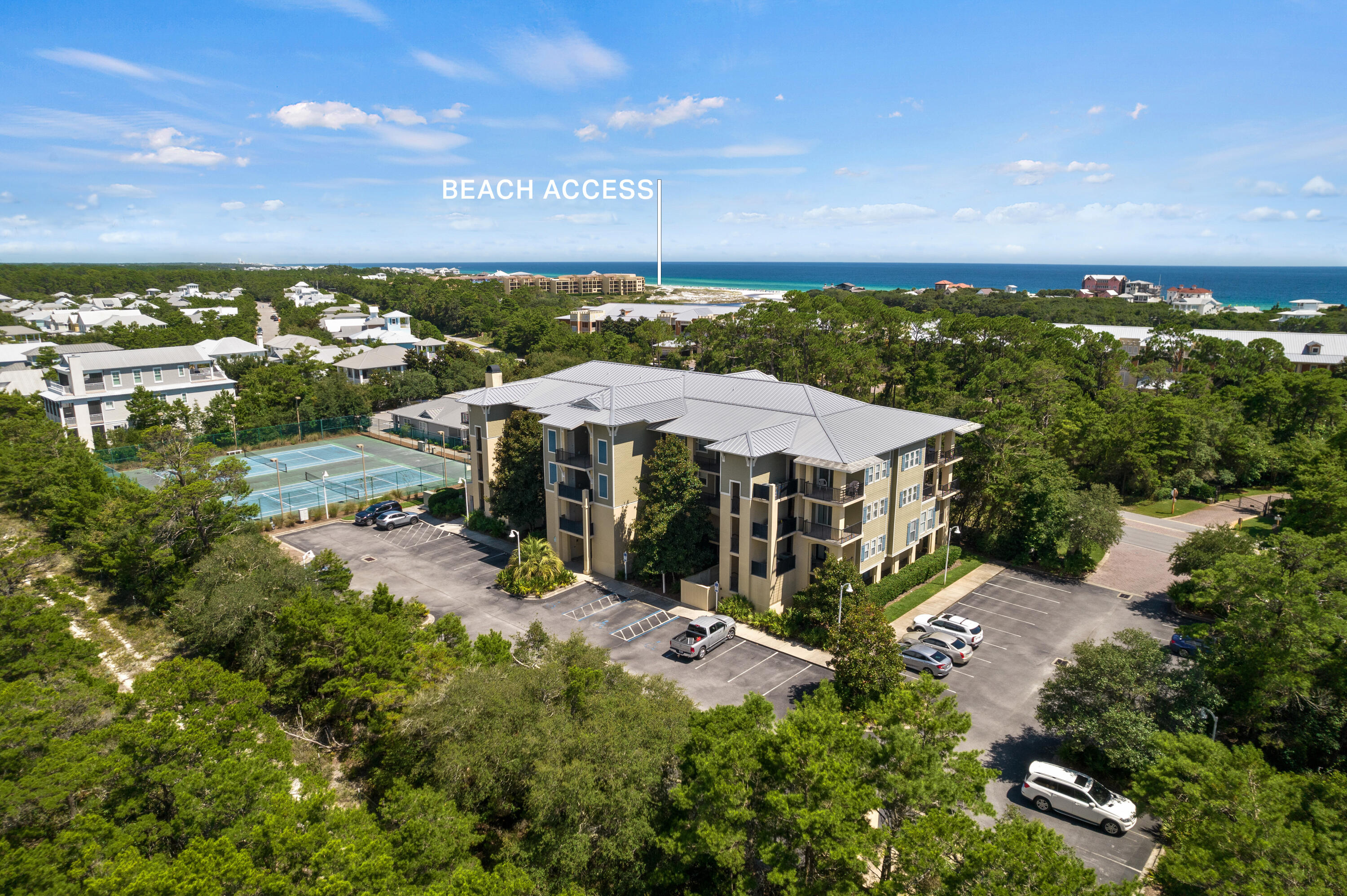 1732 West County Highway 30A, Unit 403R Santa Rosa Beach, FL 32459 - Photo 56 of 57 a view of a house with a yard