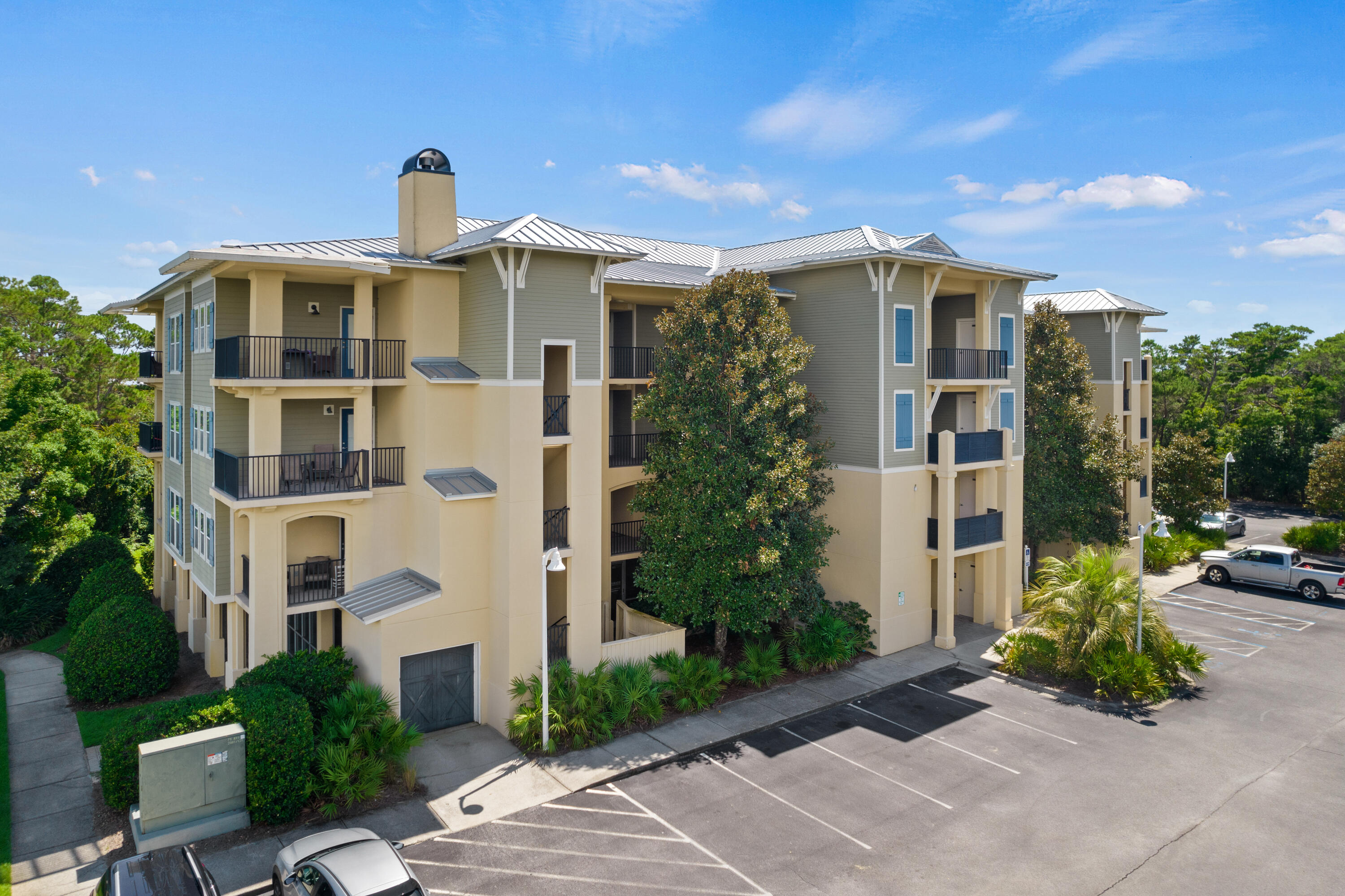 1732 West County Highway 30A, Unit 403R Santa Rosa Beach, FL 32459 - Photo 57 of 57 a front view of a building with garden