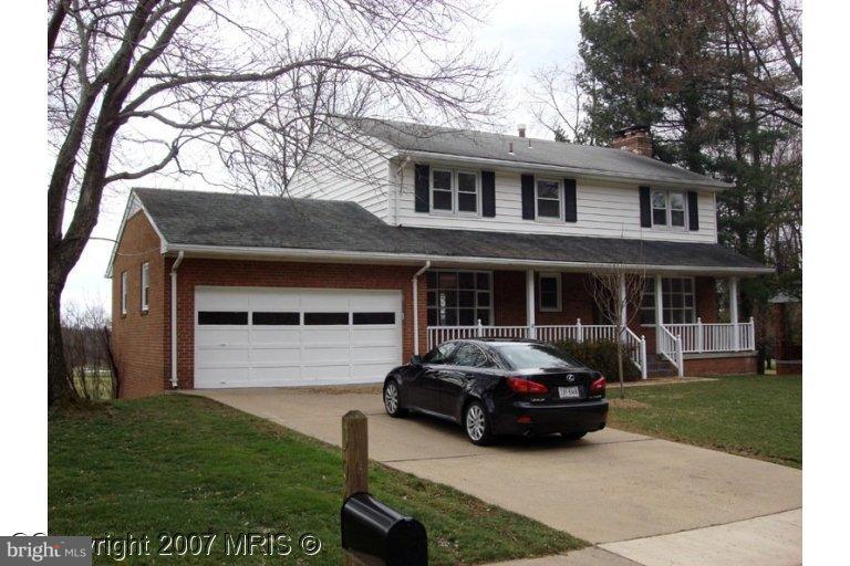 a car parked in front of a house