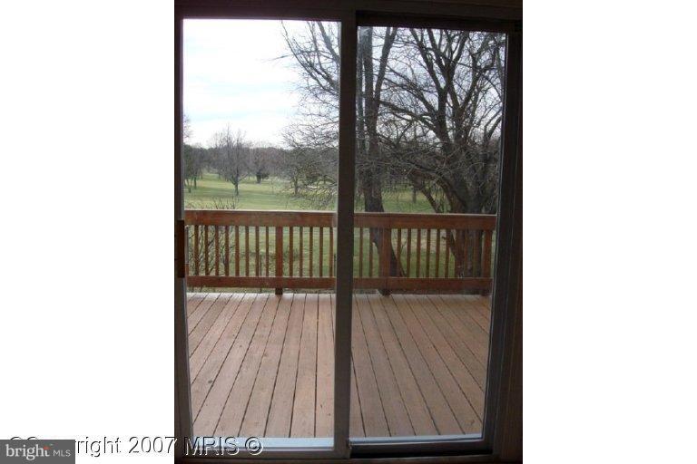 304 Old Courthouse Road Northeast Vienna, VA 22180 - Photo 14 of 20 a view of a balcony with wooden floor