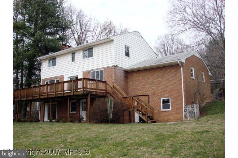 304 Old Courthouse Road Northeast Vienna, VA 22180 - Photo 17 of 20 a view of a house with a yard