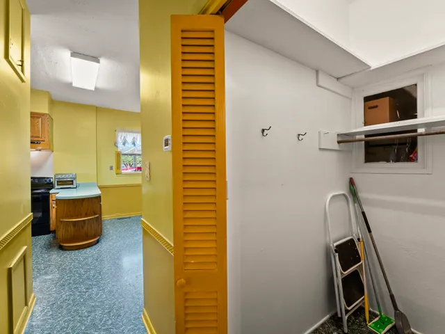 a bathroom with a sink a toilet a mirror and vanity