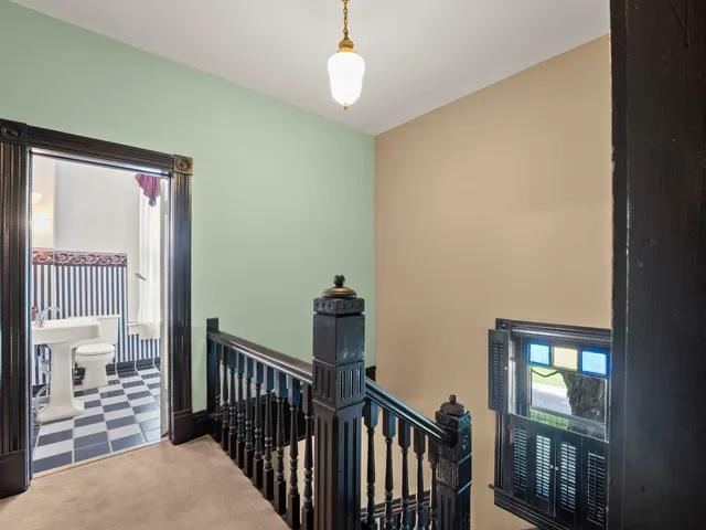 a view of a porch with wooden floor