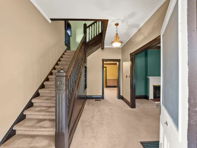 a view of a hallway with entryway