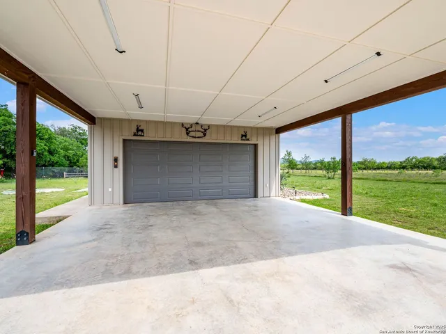 a backyard of a house with lots of green space