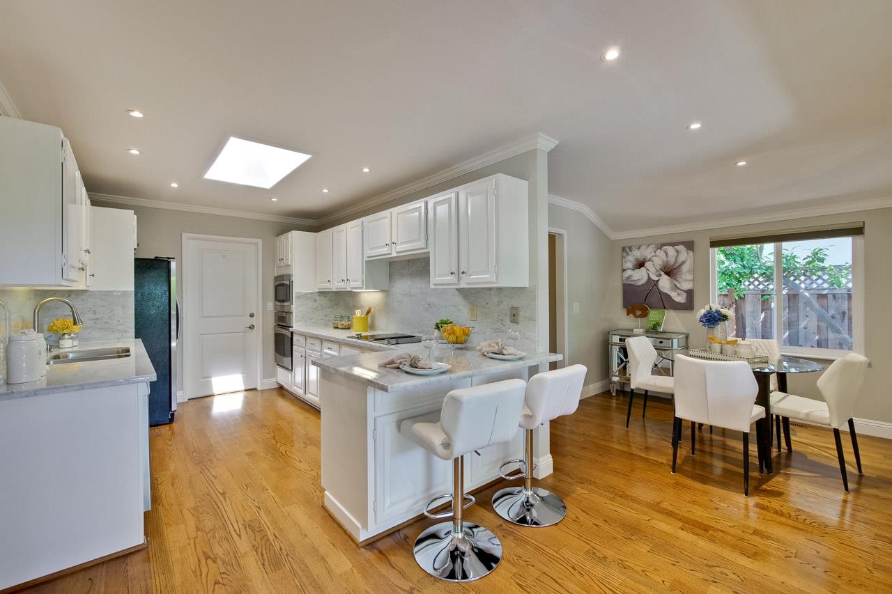 1875 Appletree Lane Mountain View, CA 94040 - Photo 14 of 39 a living room with stainless steel appliances furniture wooden floor and a view of kitchen