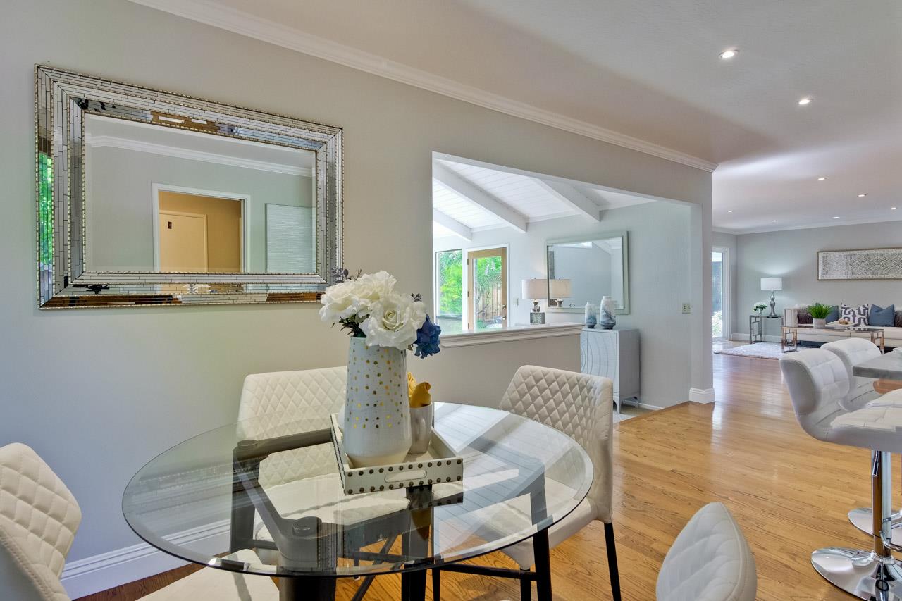 1875 Appletree Lane Mountain View, CA 94040 - Photo 17 of 39 a view of a dining room with furniture and wooden floor