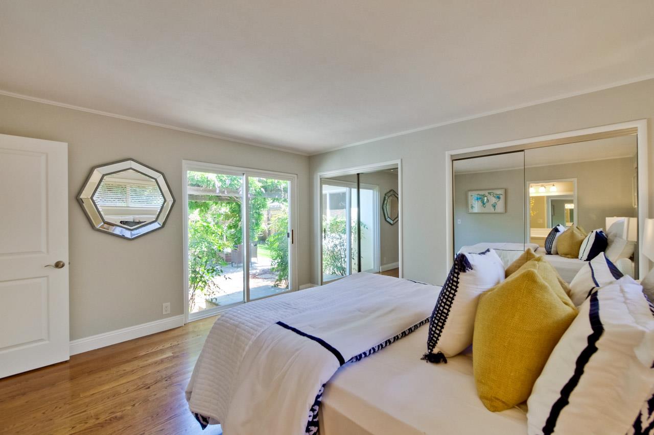 1875 Appletree Lane Mountain View, CA 94040 - Photo 20 of 39 a bedroom with a bed and wooden floor