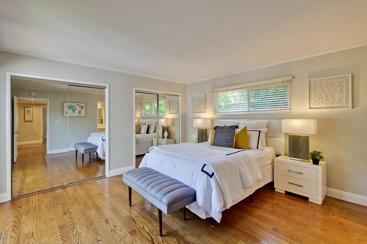 1875 Appletree Lane Mountain View, CA 94040 - Photo 21 of 39 a bedroom with a bed and wooden floor