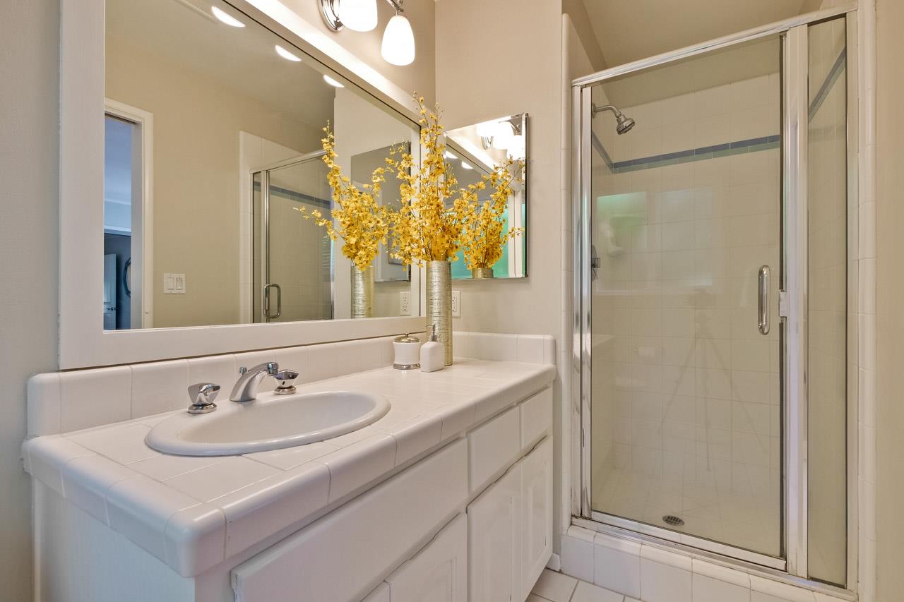1875 Appletree Lane Mountain View, CA 94040 - Photo 24 of 39 a bathroom with a sink and a mirror
