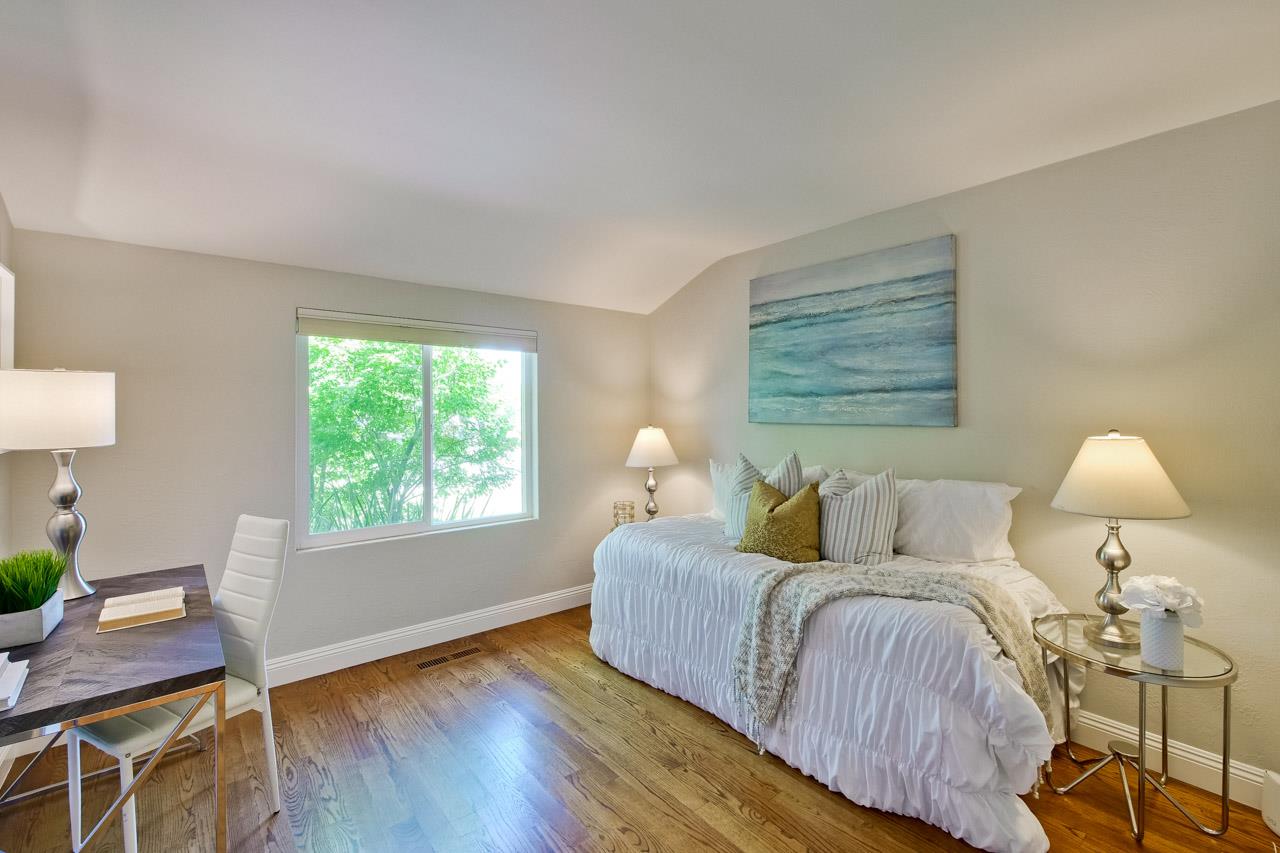 1875 Appletree Lane Mountain View, CA 94040 - Photo 27 of 39 a bedroom with a bed lamps and window
