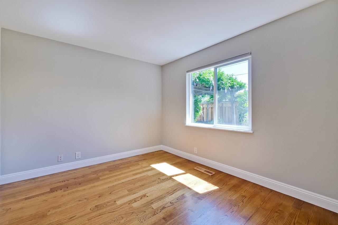 1875 Appletree Lane Mountain View, CA 94040 - Photo 29 of 39 a view of empty room with wooden floor and fan