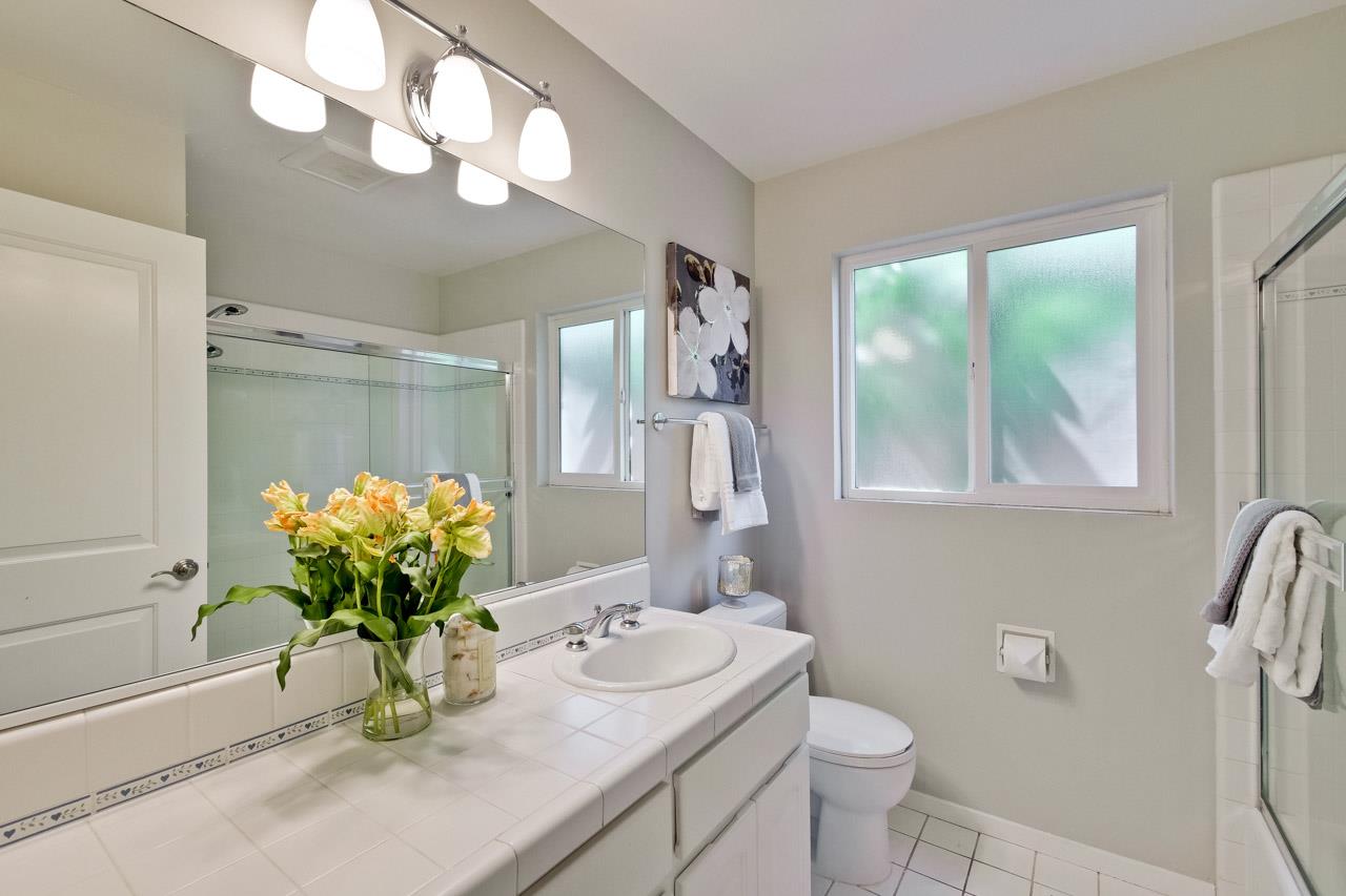 1875 Appletree Lane Mountain View, CA 94040 - Photo 31 of 39 a bathroom with a sink a toilet and a mirror