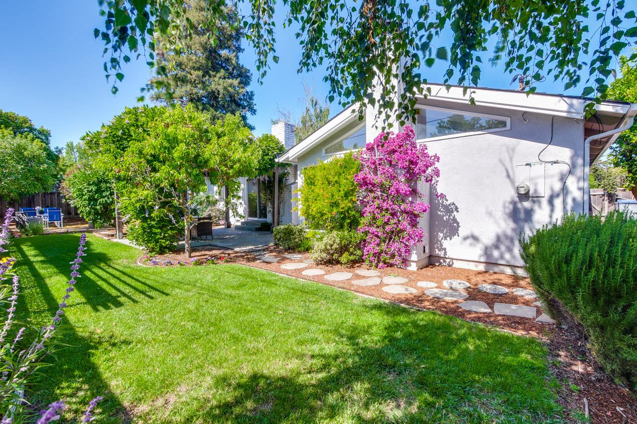 1875 Appletree Lane Mountain View, CA 94040 - Photo 35 of 39 a view of backyard with plants and outdoor seating