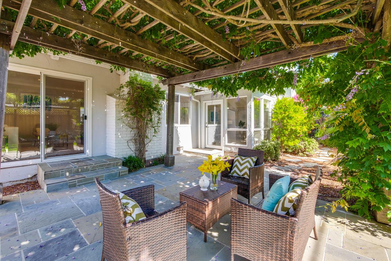 1875 Appletree Lane Mountain View, CA 94040 - Photo 37 of 39 a view of a patio with table and chairs and potted plants
