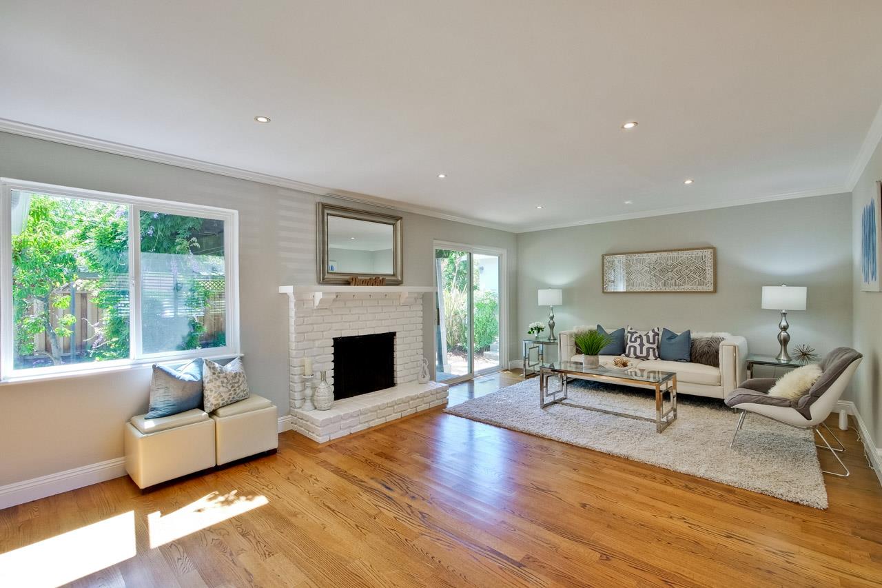 1875 Appletree Lane Mountain View, CA 94040 - Photo 4 of 39 a living room with furniture and a fireplace