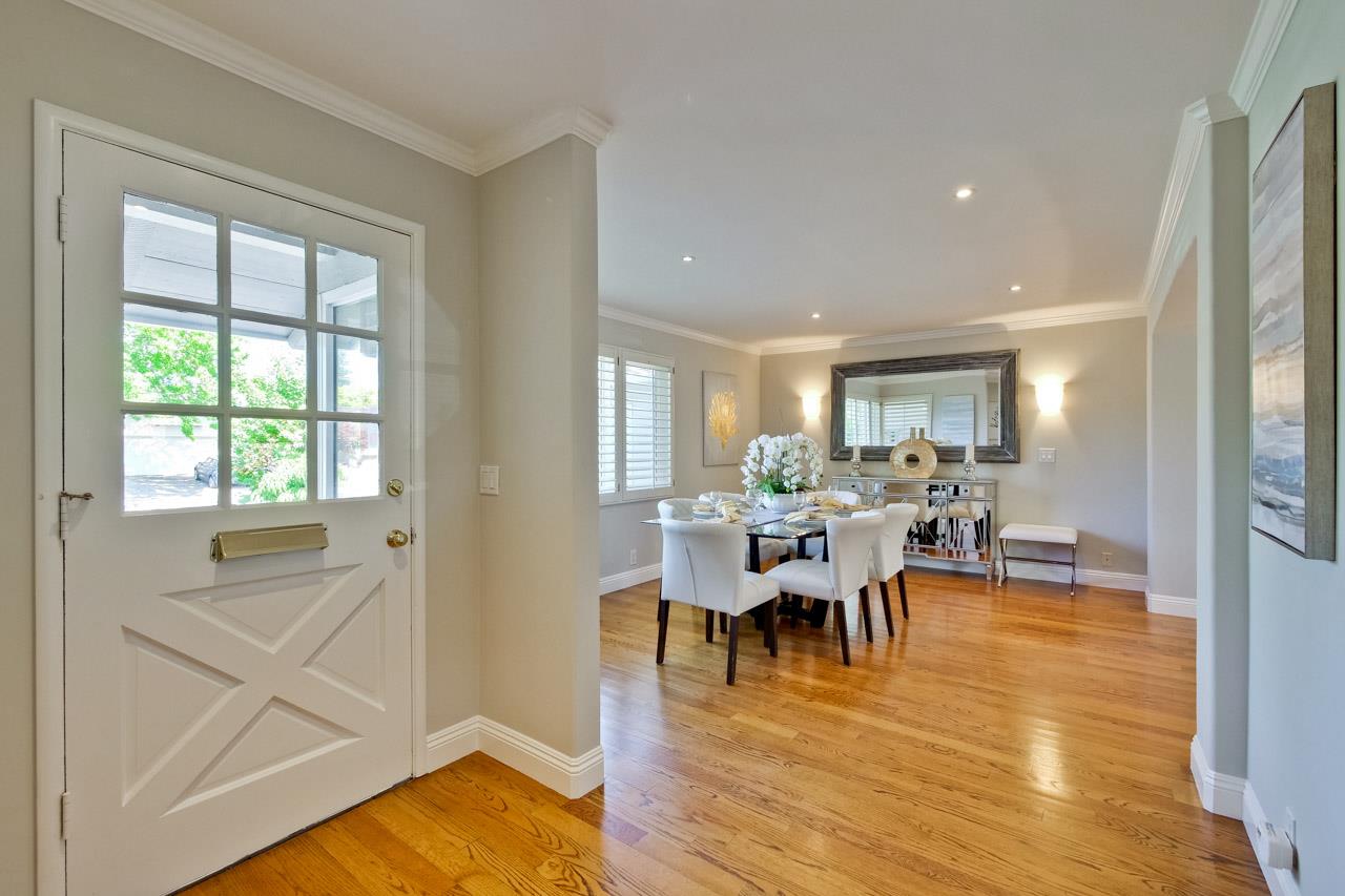 1875 Appletree Lane Mountain View, CA 94040 - Photo 9 of 39 a view of a dining room with furniture window and wooden floor