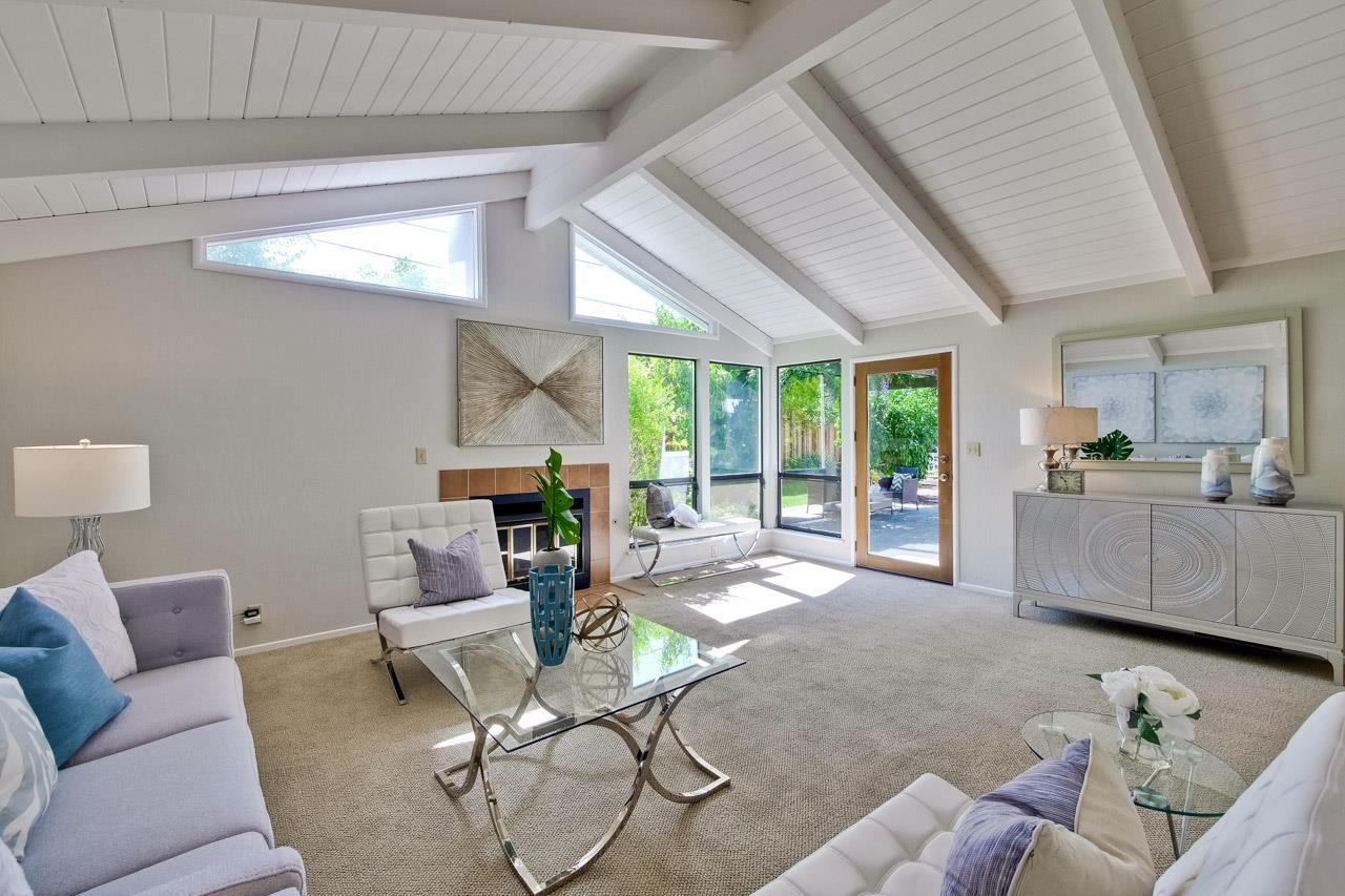 1875 Appletree Lane Mountain View, CA 94040 - Photo 10 of 39 a living room with furniture and a large window