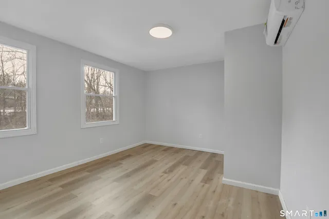 an empty room with windows