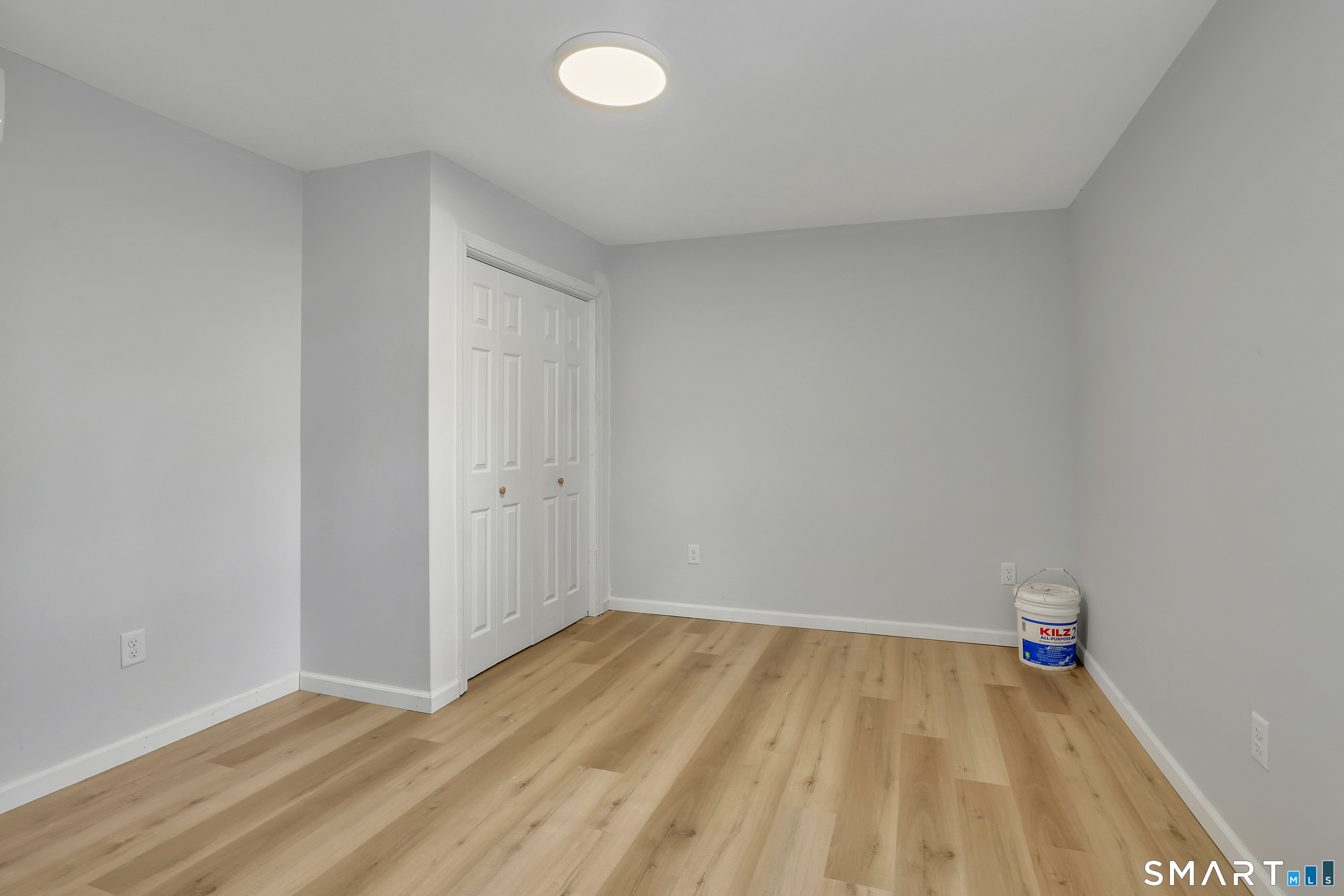 194 Hartford Road, Unit A Manchester, CT 06040 - Photo 10 of 14 a view of a room with wooden floor