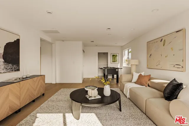 a view of balcony with furniture and garden