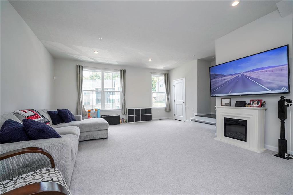 157 Cole Drive McKees Rocks, PA 15136 - Photo 3 of 25 Spacious Livingroom with high ceiling and mounted TV stays!