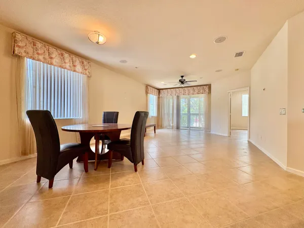 a view of a dining room with furniture