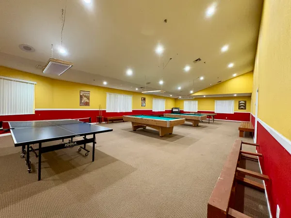 a room with table tennis table