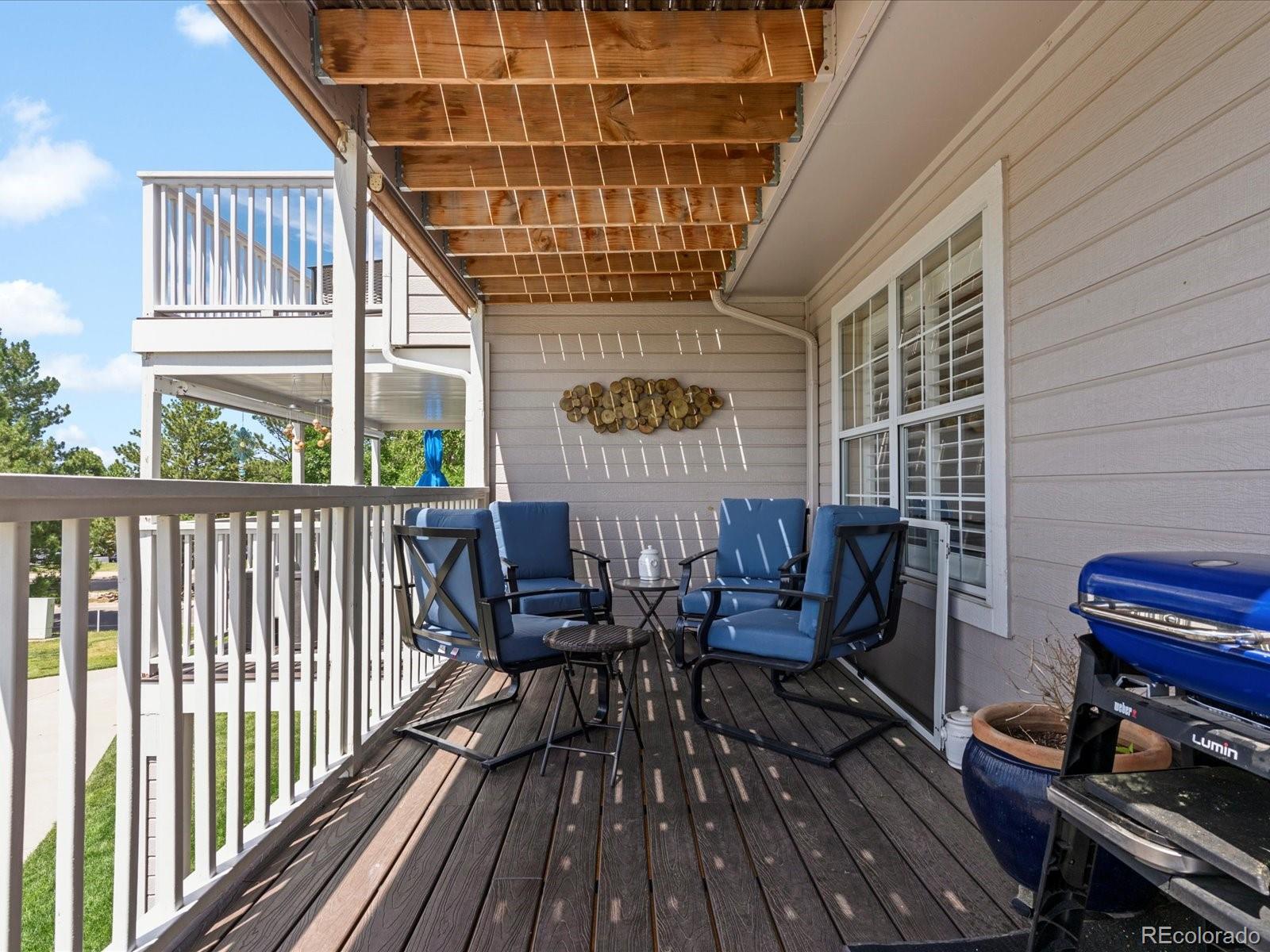 9323 Notts Court Lone Tree, CO 80124 - Photo 10 of 45 a view of a chairs on the roof deck