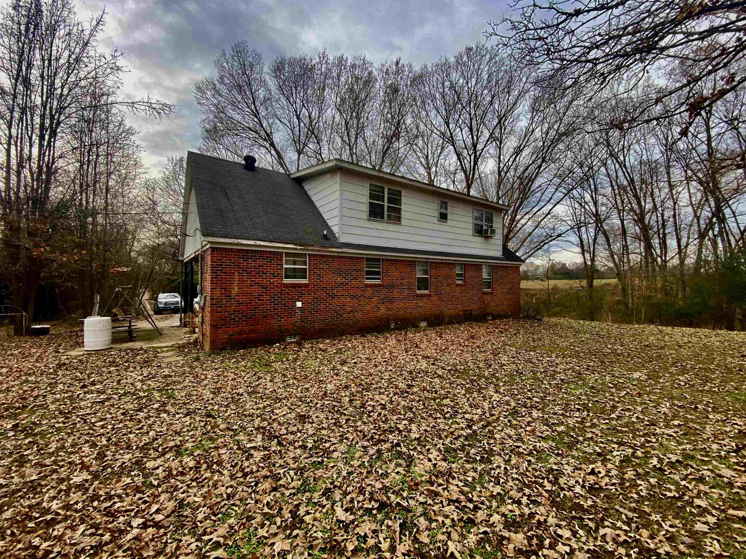 860 Allen Road Williston, TN 38076 - Photo 3 of 13 a front view of a house with a yard