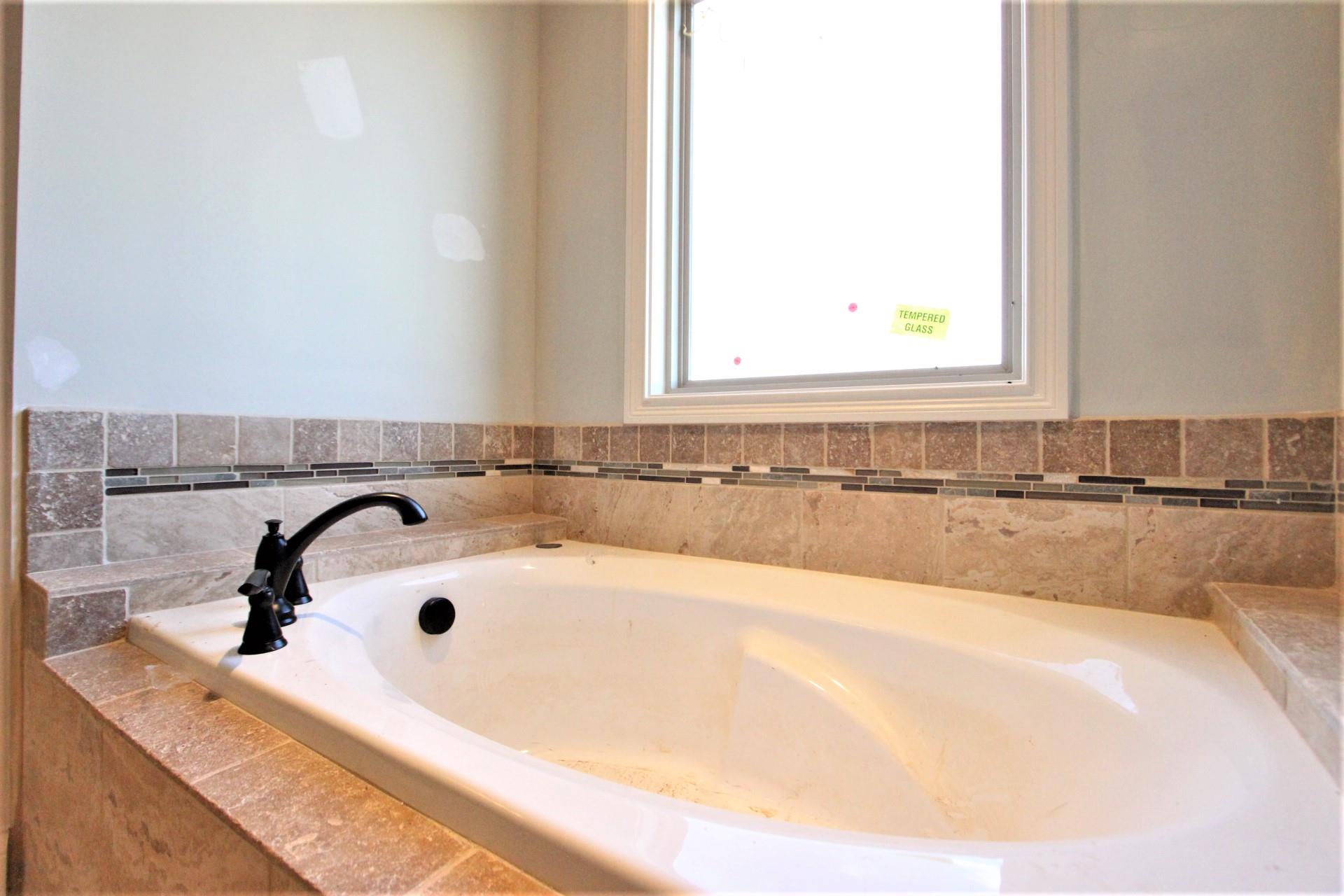 151 Springfield Drive, Unit 57 Lebanon, TN 37087 - Photo 19 of 23 Garden Tub With Custom Tile Backsplash