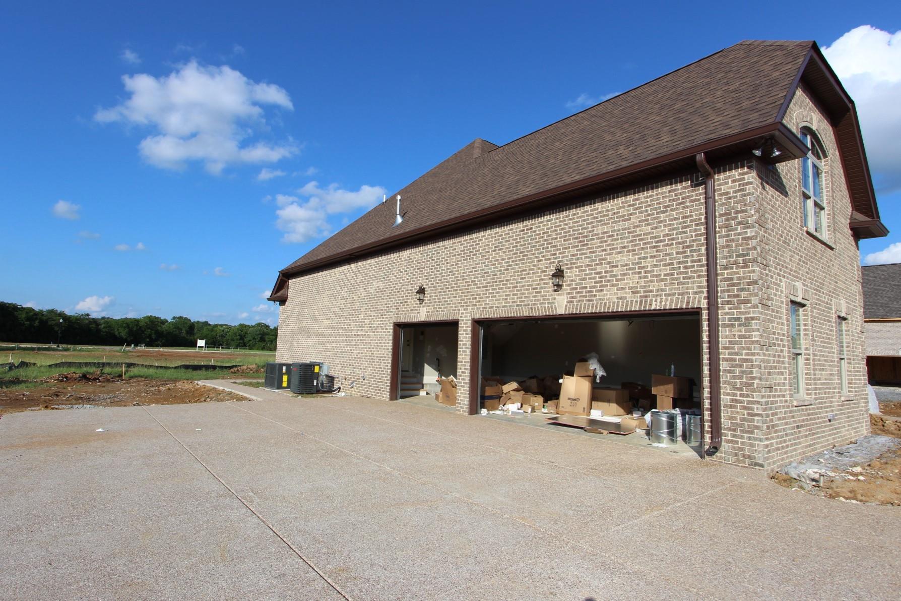 151 Springfield Drive, Unit 57 Lebanon, TN 37087 - Photo 23 of 23 3-Car Side Entry Garage With Large Turnaround
