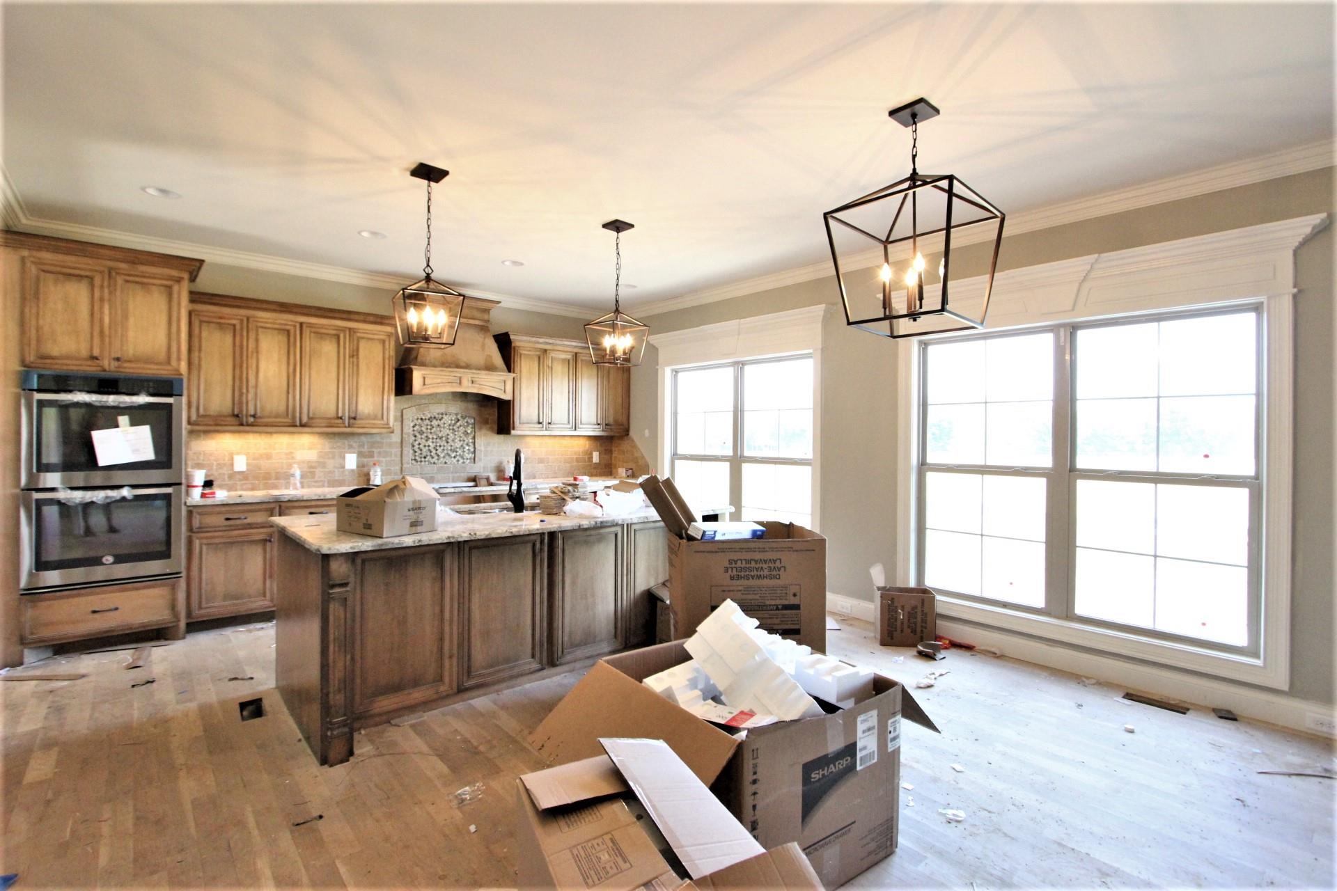 151 Springfield Drive, Unit 57 Lebanon, TN 37087 - Photo 8 of 23 Kitchen With Large Dining Area
