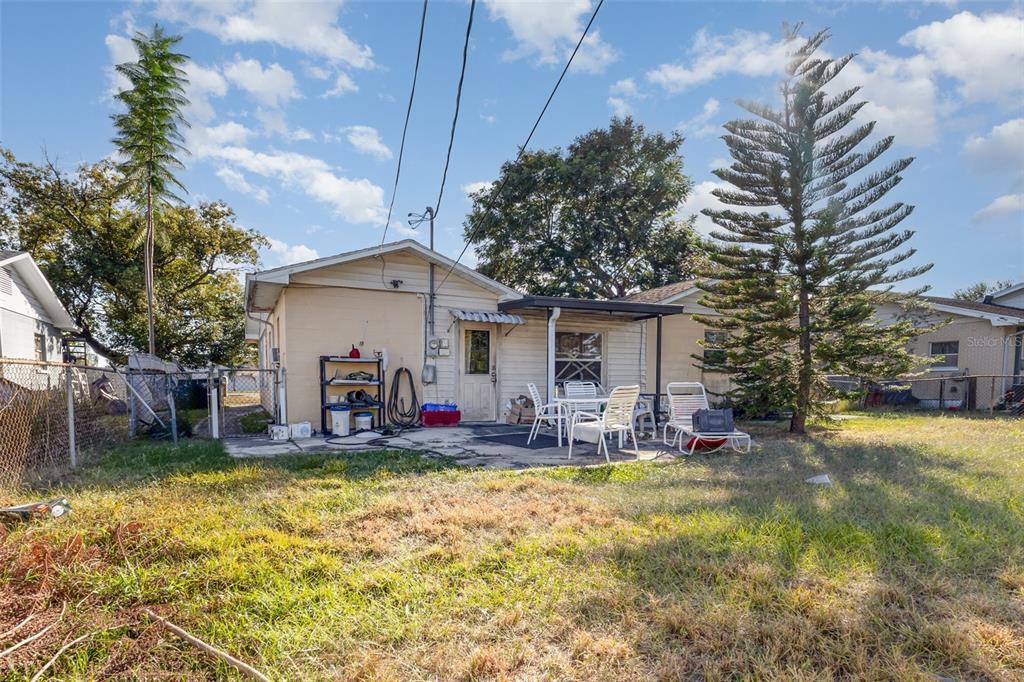 1638 East Main Street Lakeland, FL 33801 - Photo 14 of 16 a view of a house with a yard and sitting area