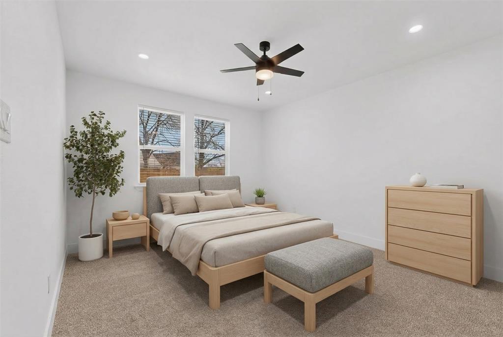 106 Jones Street Terrell, TX 75160 - Photo 14 of 26 a bedroom with a bed and a closet