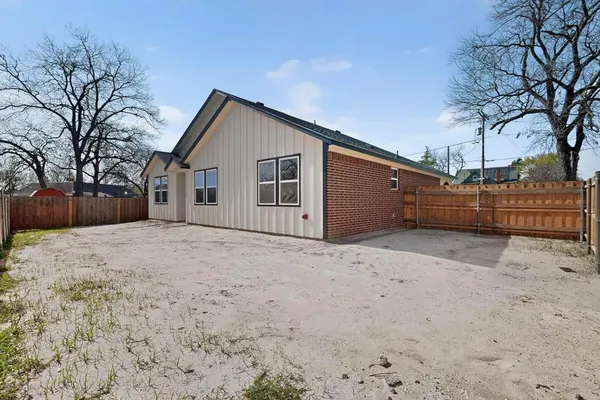 a view of backyard of house