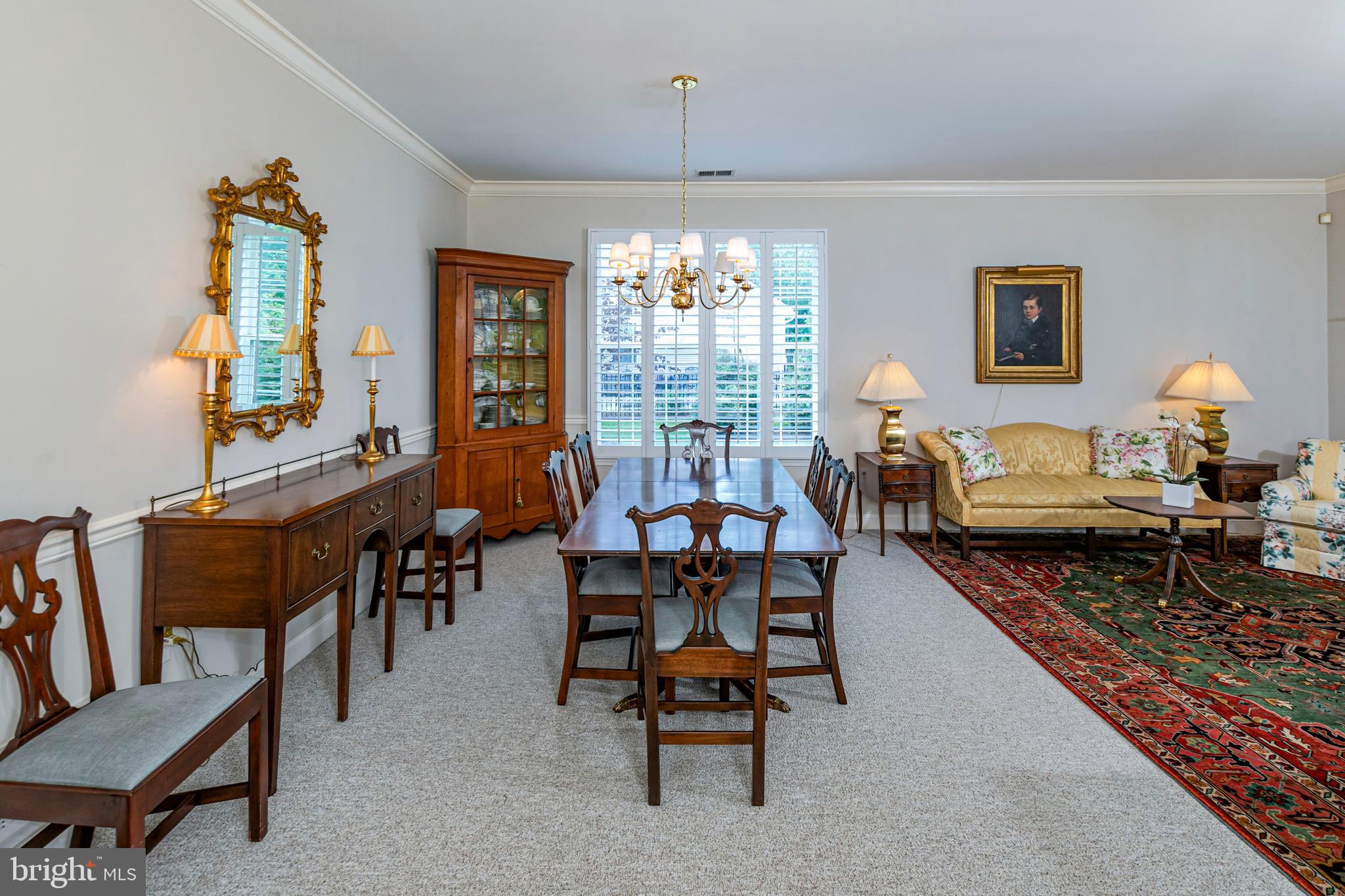 24 Foster Road Pennington, NJ 08534 - Photo 6 of 38 a living room with furniture and a chandelier