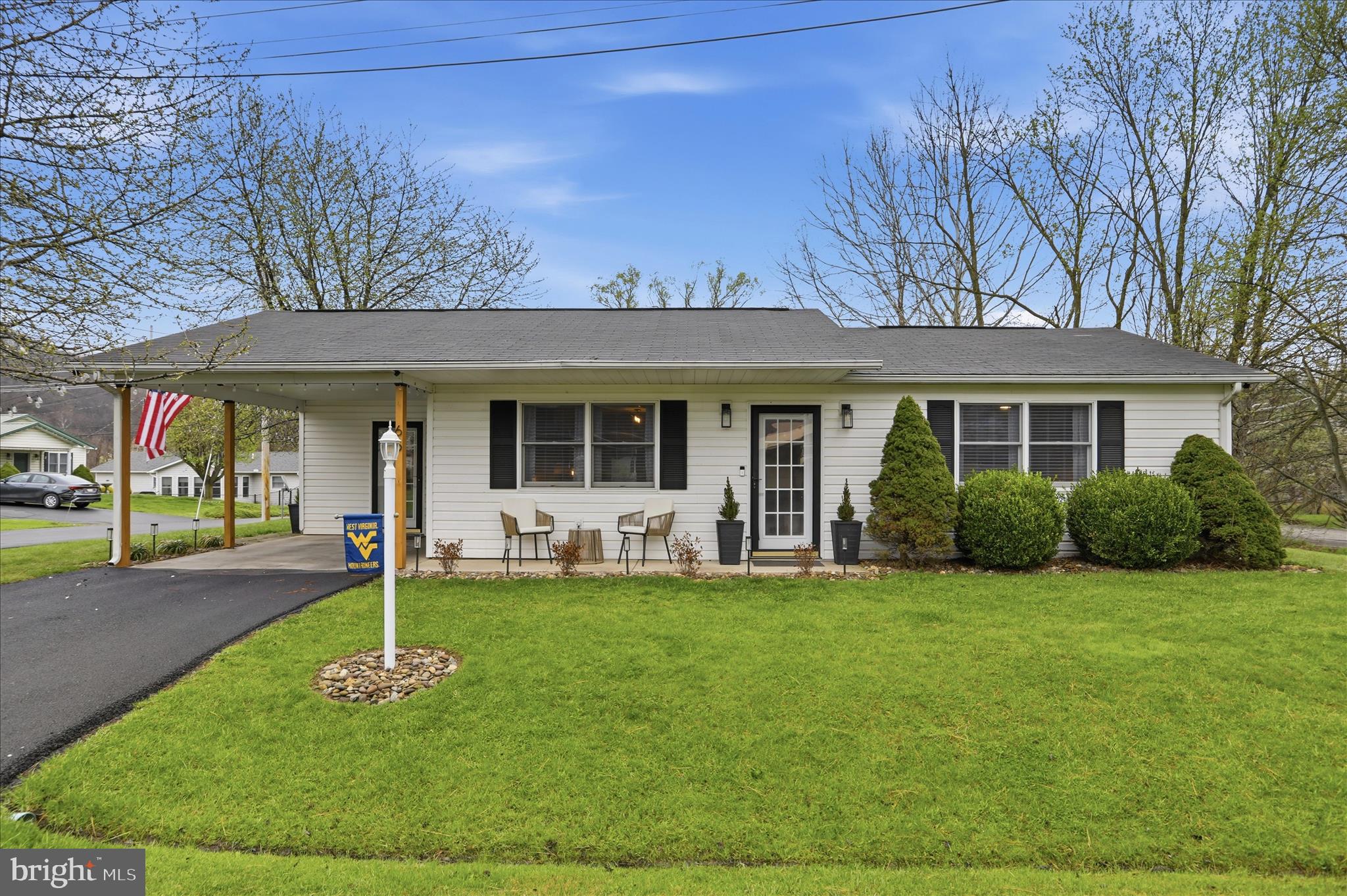 65 South Hummingbird Street Keyser, WV 26726 - Photo 1 of 30 a front view of a house with a yard