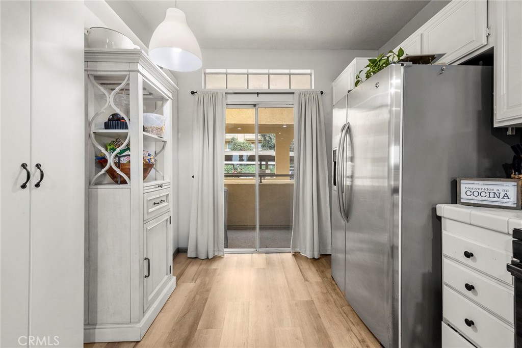 4512 Workman Mill Road Whittier, CA 90601 - Photo 13 of 28 Open kitchen with area for small table. Slider to balcony.