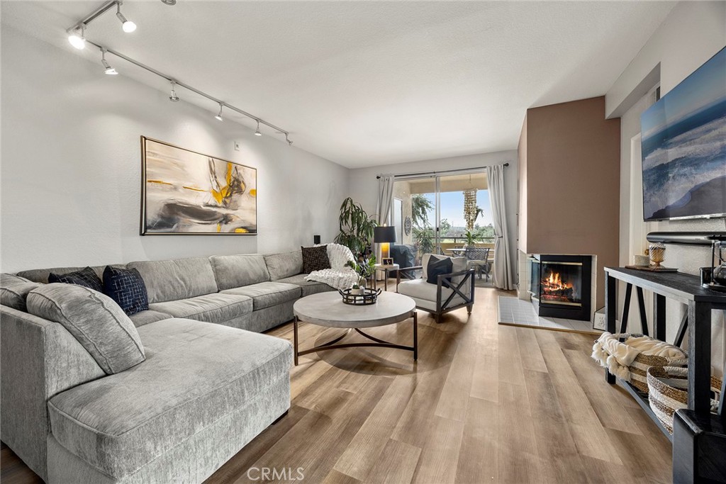 4512 Workman Mill Road Whittier, CA 90601 - Photo 9 of 28 Spacious living and entertaining space with fireplace.