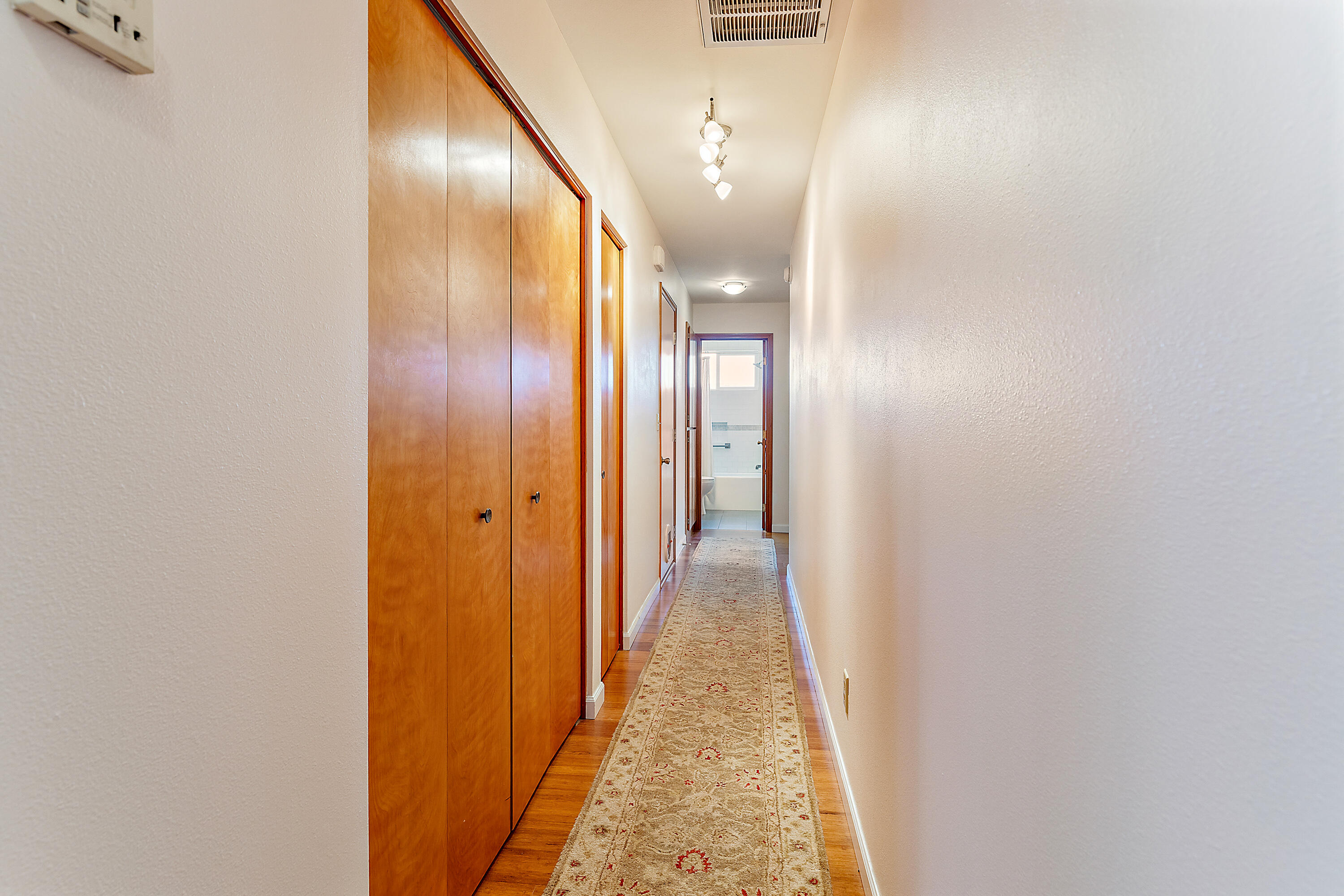 1364 Mill Pond Road Ashland, OR 97520 - Photo 34 of 38 Hallway with washer/dryer to the left