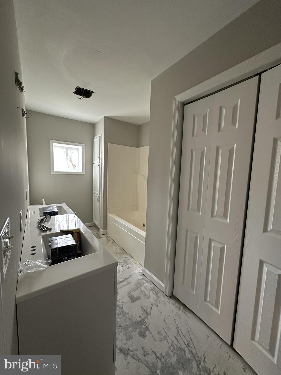 2642 Spring Road Chambersburg, PA 17202 - Photo 17 of 18 a bedroom with a bed and a table in it