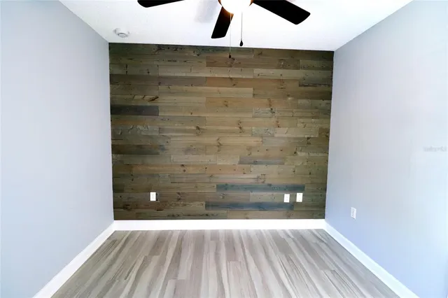 a view of a swimming pool with a lounge chairs