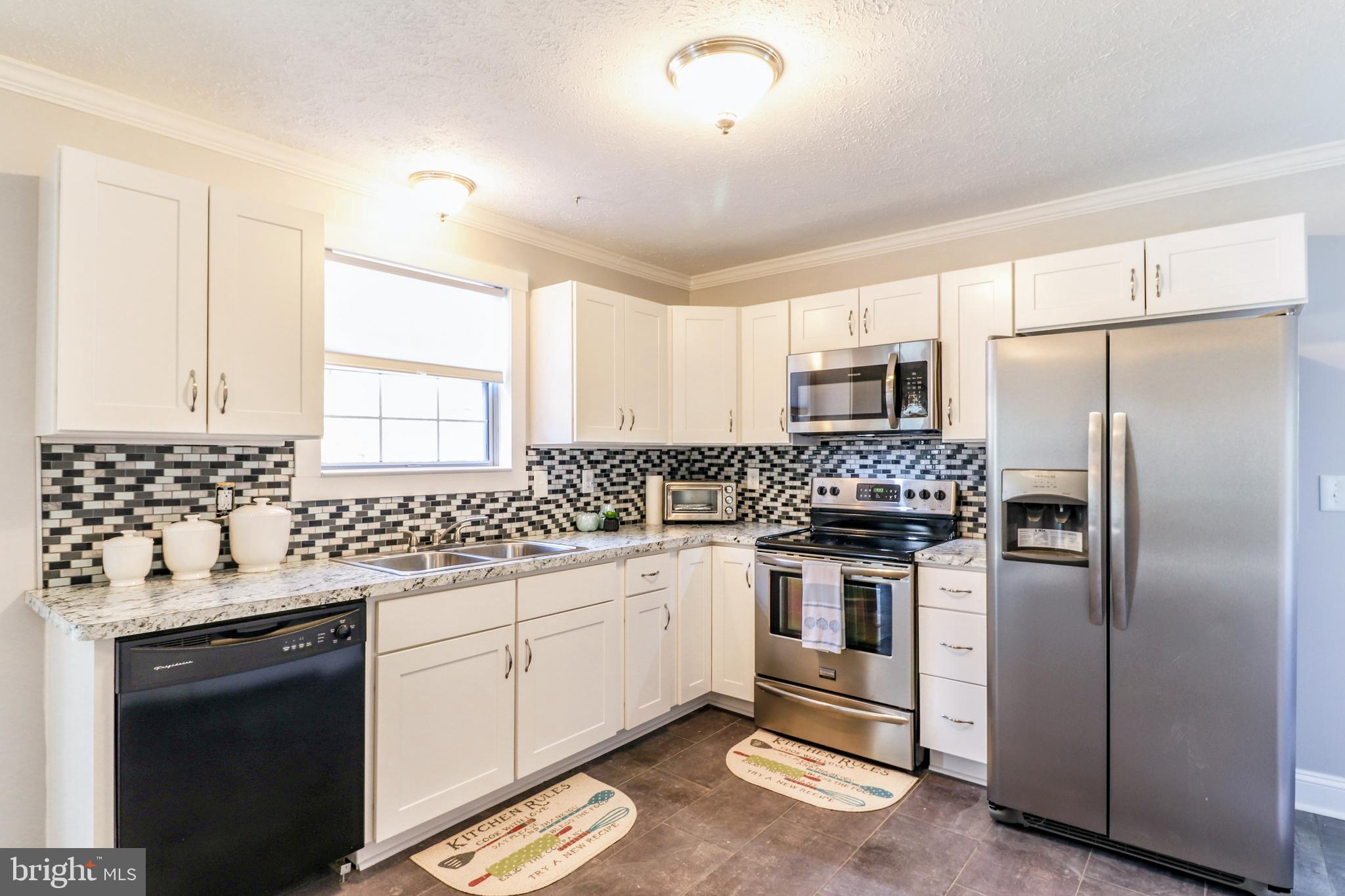 11421 Redlands Road Lusby, MD 20657 - Photo 3 of 17 Beautifully Done Backsplash and Detail Work