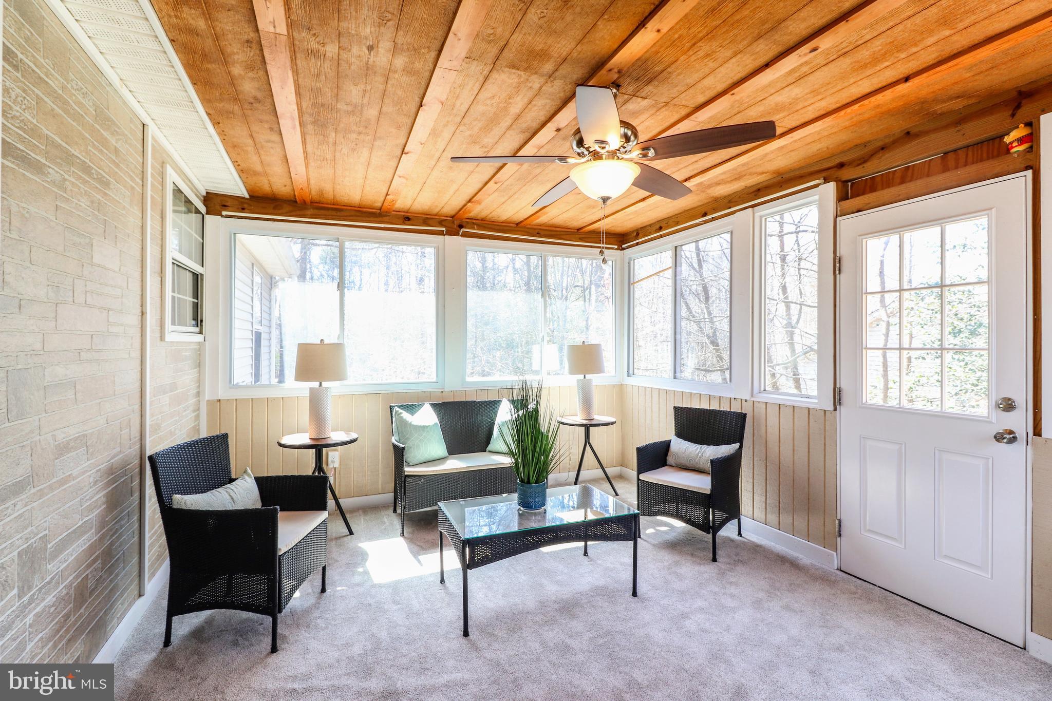 11421 Redlands Road Lusby, MD 20657 - Photo 6 of 17 Sun Room Off Kitchen with Ramp Access Outside