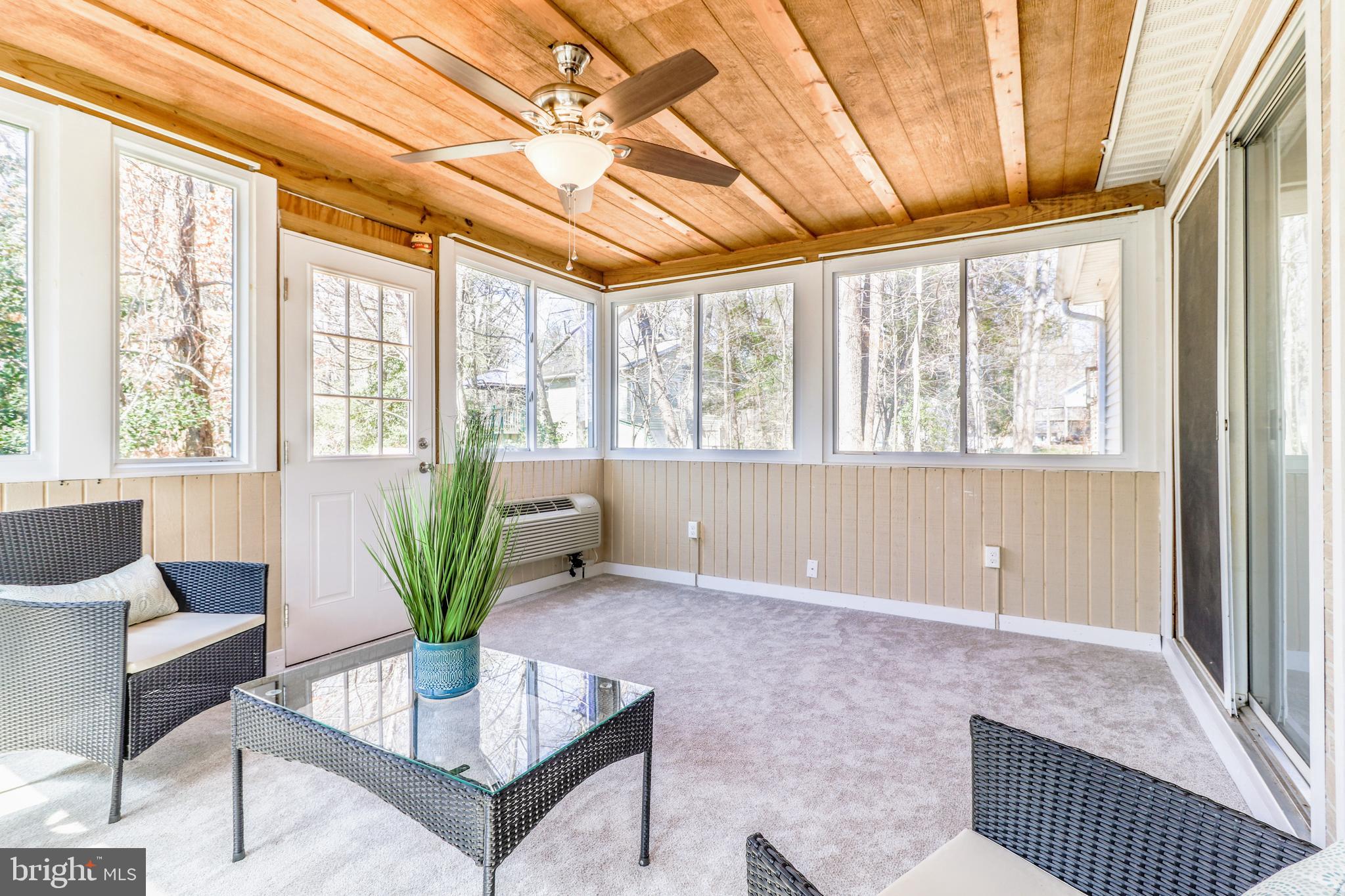 11421 Redlands Road Lusby, MD 20657 - Photo 7 of 17 Wrap Around Windows to Enjoy Sun and Nature!