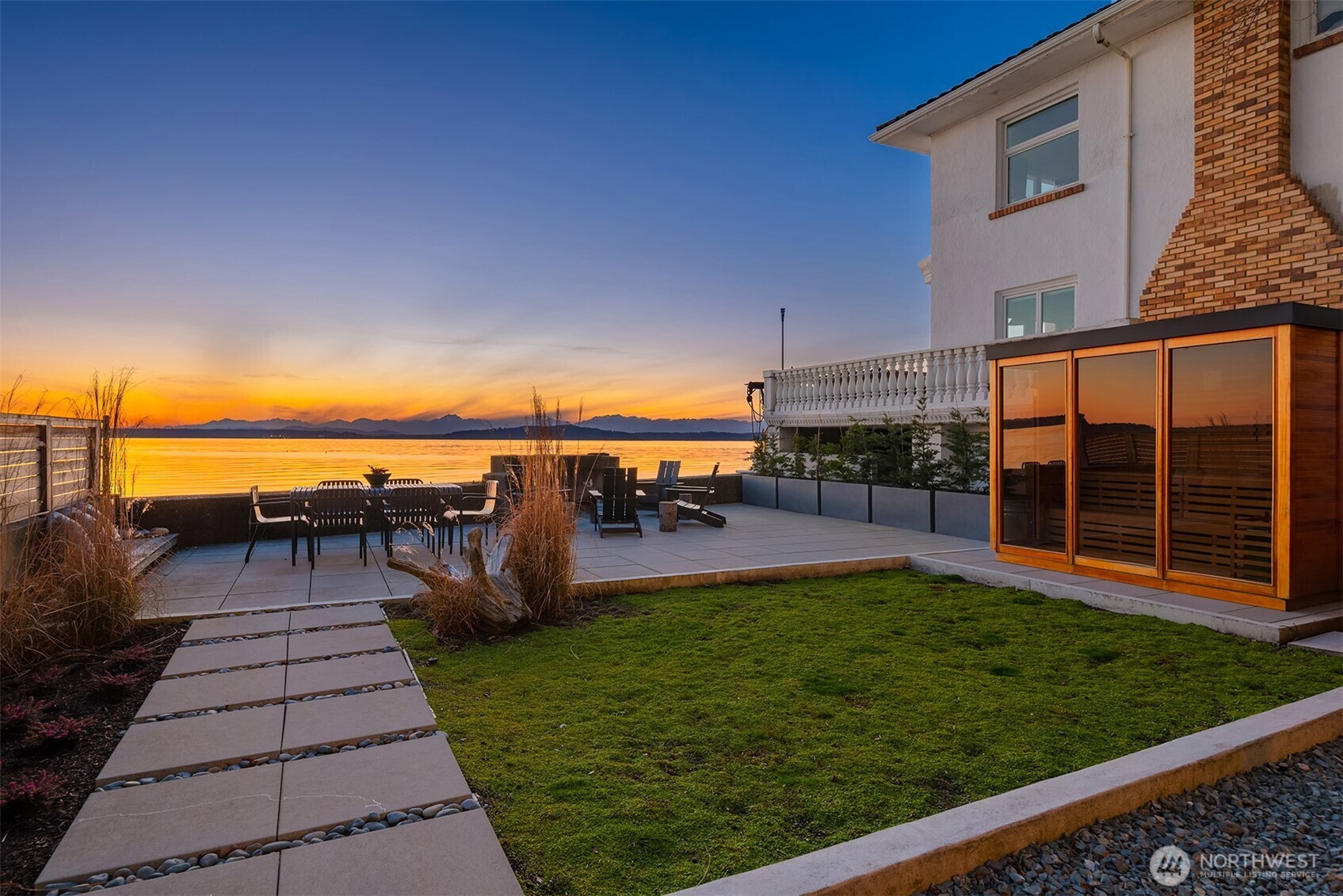 4717 Beach Drive Southwest Seattle, WA 98116 - Photo 2 of 11 a view of a swimming pool with a patio