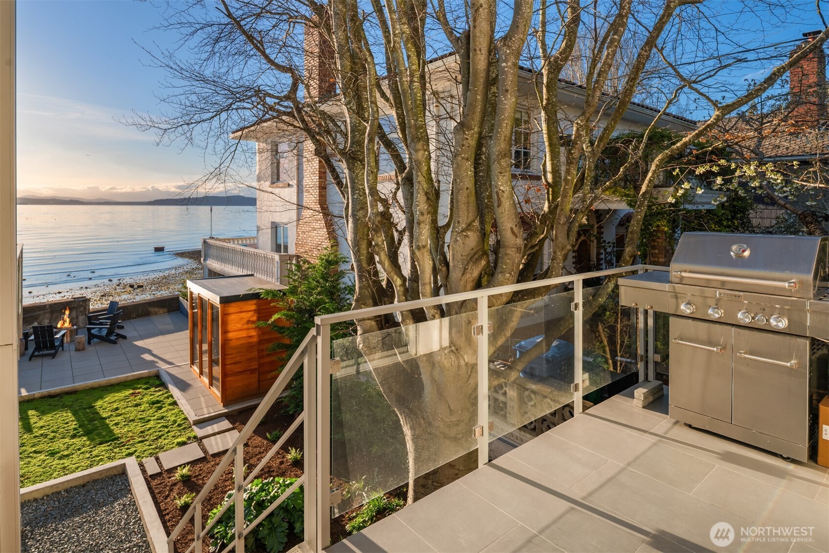 4717 Beach Drive Southwest Seattle, WA 98116 - Photo 7 of 11 a view of a backyard with sitting area