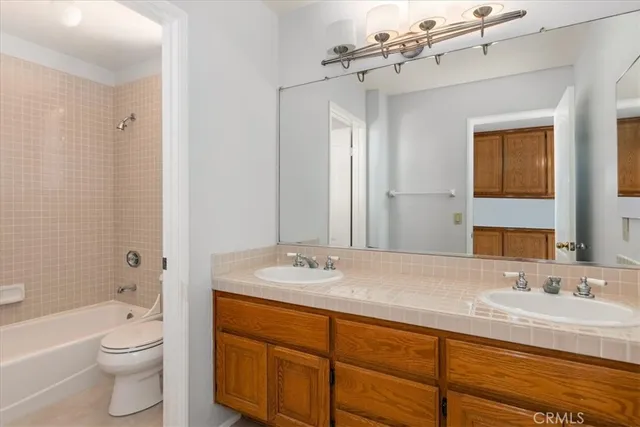 a view of an empty room and closet area