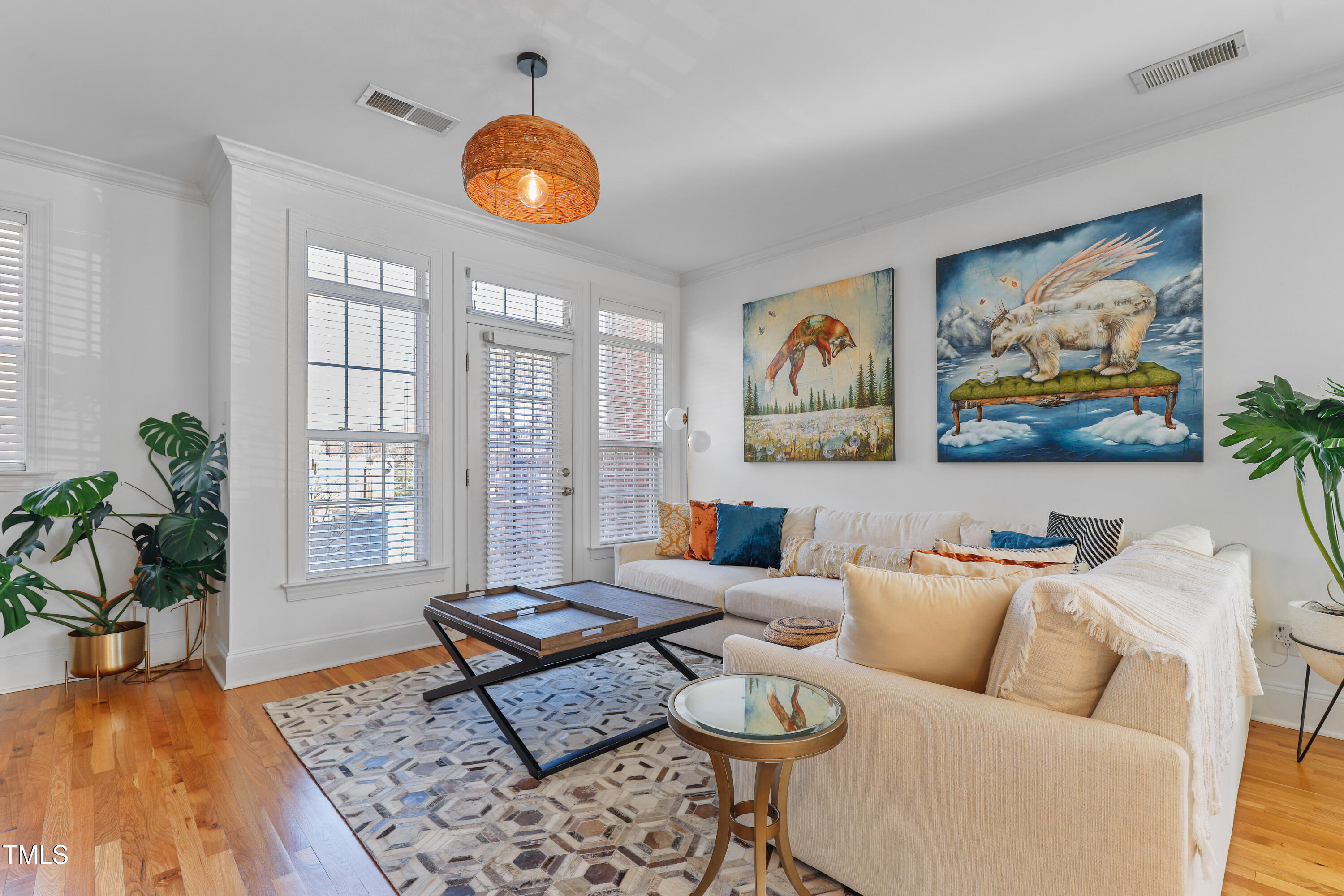 672 Highpark Lane Raleigh, NC 27608 - Photo 12 of 25 a living room with furniture and a large window